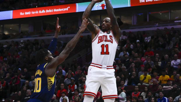 Oct 26, 2022; Chicago, Illinois, USA; Chicago Bulls forward DeMar DeRozan (11) shoots the ball over Indiana Pacers guard Bennedict Mathurin (00) during the first half at the United Center. Mandatory Credit: Matt Marton-USA TODAY Sports